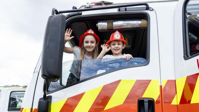 Ella Jade, 7, and Chase Robert, 4, got the firey experience at the Luddenham Show. Picture: AAP/Matthew Vasilescu