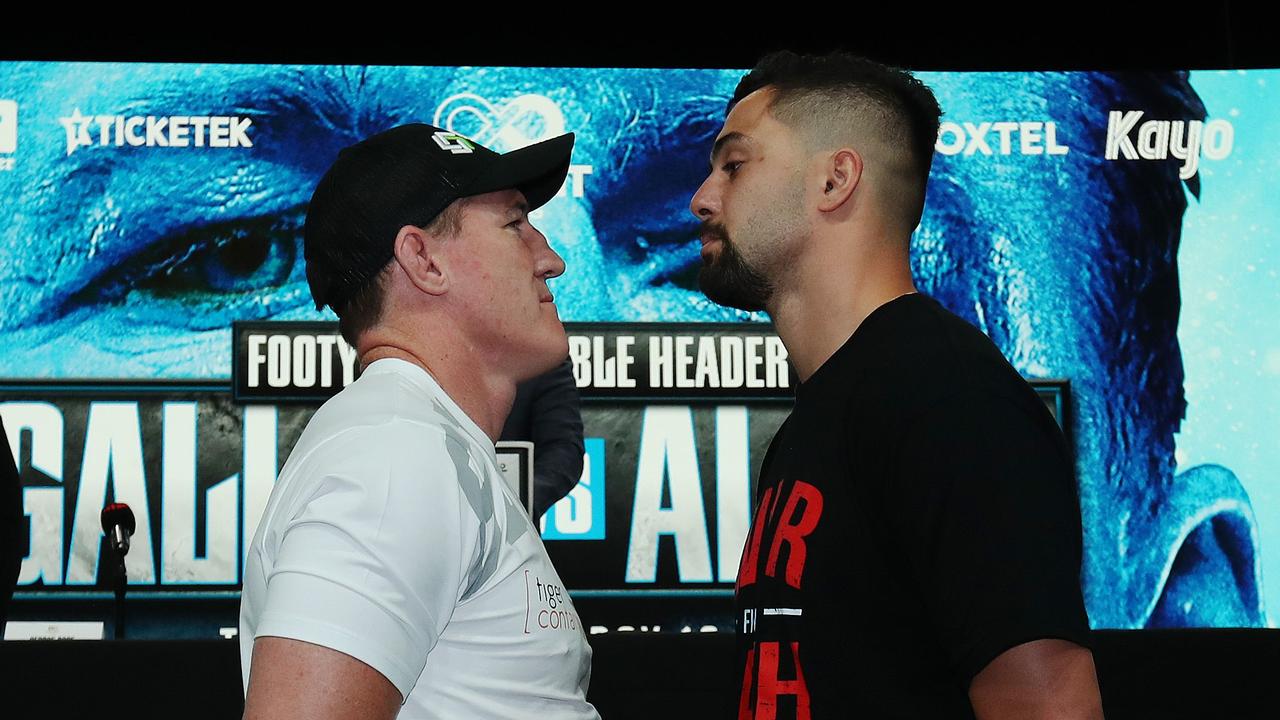 Paul Gallen and Josh Aloiai face off ahead of their heavyweight fight in Newcastle on December 10. Photo by Brett Costello