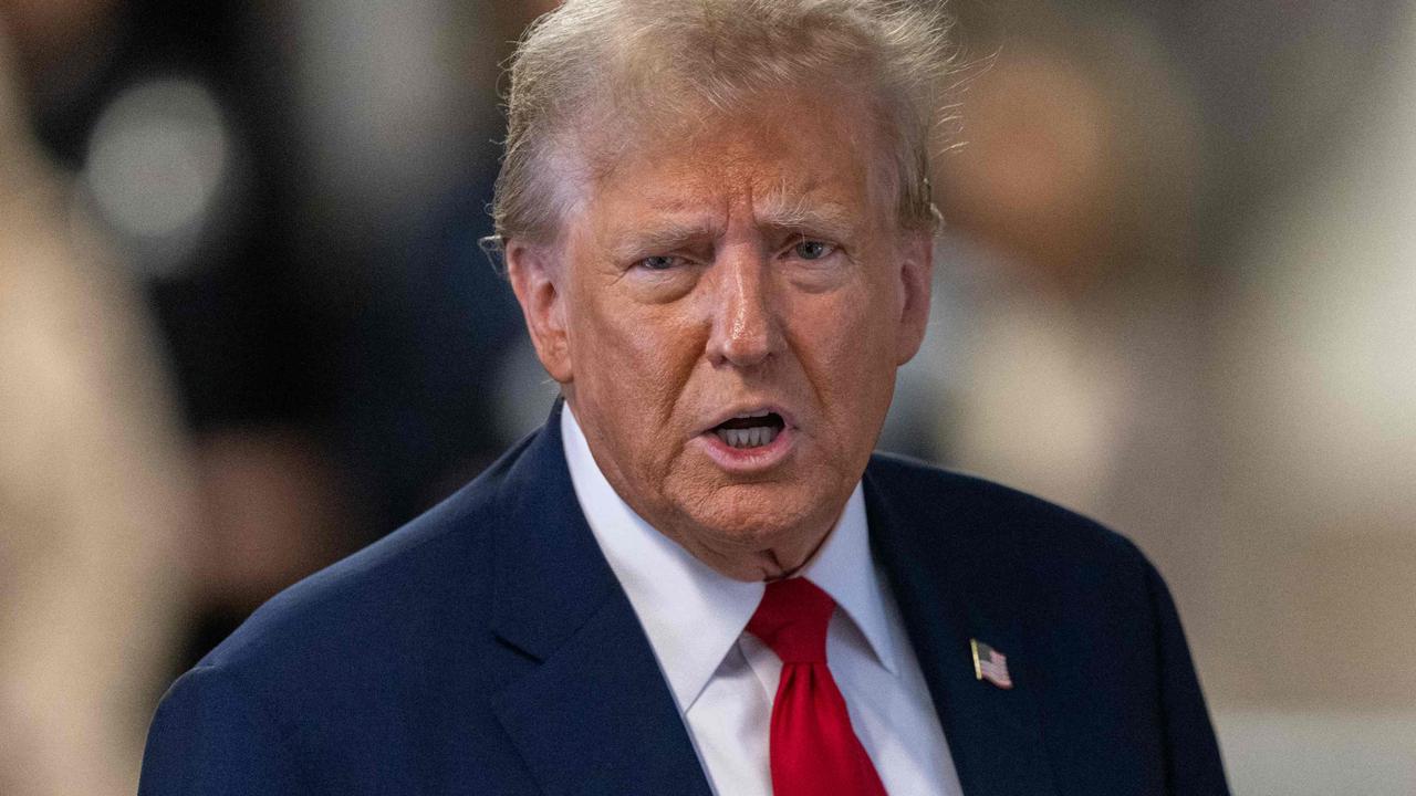 Former US President Donald Trump speaks to the media as he arrives for his trial for allegedly covering up hush money payments. (Photo by JEENAH MOON / POOL / AFP)