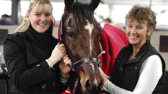 n02mt901 Melton Harness Racing first day and official opening. Large Aslife Lombo trained by Graham Tindale of Melton with Chloe Tindale and trainer Karlene Tindale