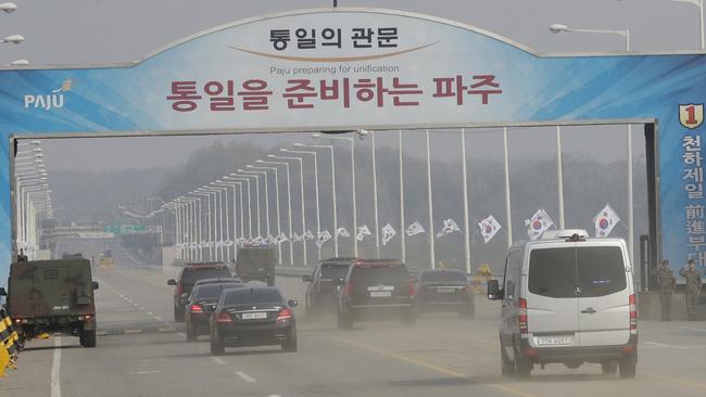 President Moon’s motorcade crosses the Unification Bridge on the way to  Panmunjom in the Demilitarized Zone. Picture: AP.