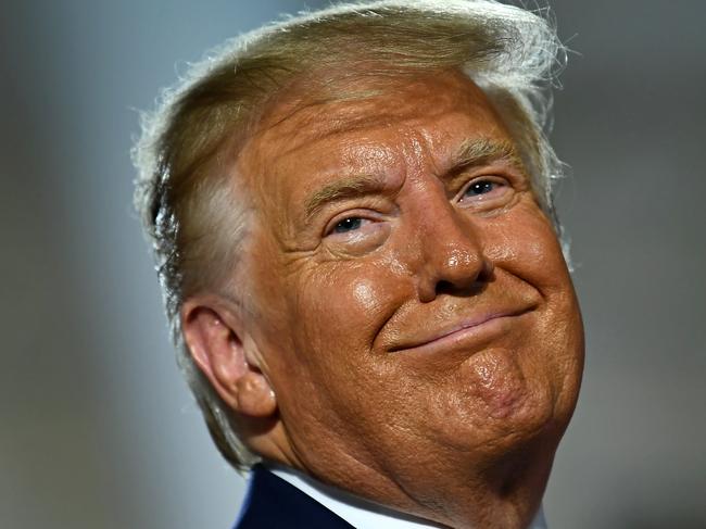 US President Donald Trump looks on after delivering his acceptance speech for the Republican Party nomination for reelection during the final day of the Republican National Convention at the South Lawn of the White House in Washington, DC on August 27, 2020. (Photo by Brendan Smialowski / AFP)