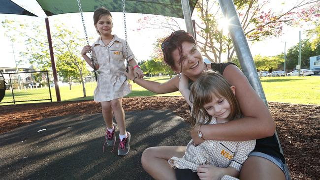 21/5/2019 : Traditionally a Labor voter Rachel Bierling, 31, (L-R) Helena, 7, and Olivia, 5, voted Liberal this time because  she was scared of change and its effect on the economy, in a park behind Wayne swans old office in Nundah, Brisbane. Lyndon Mechielsen/The Australian