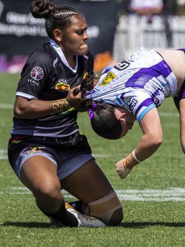 Savannah Roberts-Hickling makes a tackle at the Koori Knockout. Picture: Andrea Francolini