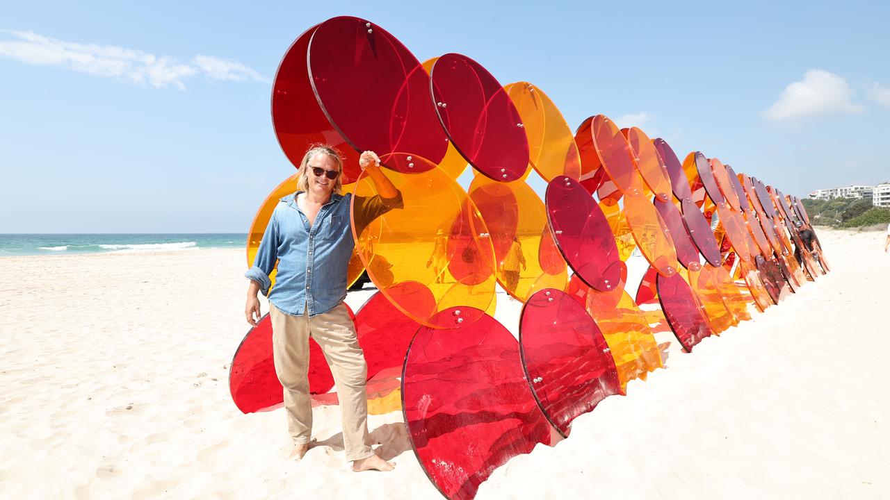 Swell Festival at Currumbin. Sculptor Clayton Blake with his work.Ã¢â&#130;¬Å&#147;SHIFAÃ¢â&#130;¬Â&#157; Picture Glenn Hampson