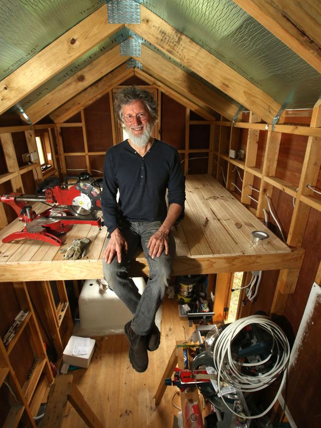 Fred Schultz inside the tiny house. Picture: Stuart Milligan.