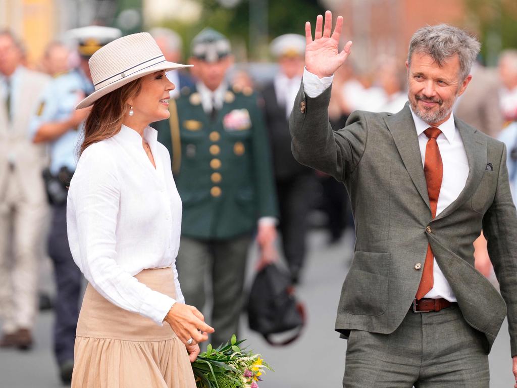 The couple were all smiles during the tour. Picture: AFP