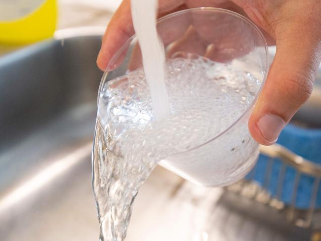 Tap water provides fluoride to 90 per cent of Australians. Picture: Alastair Pike / AFP