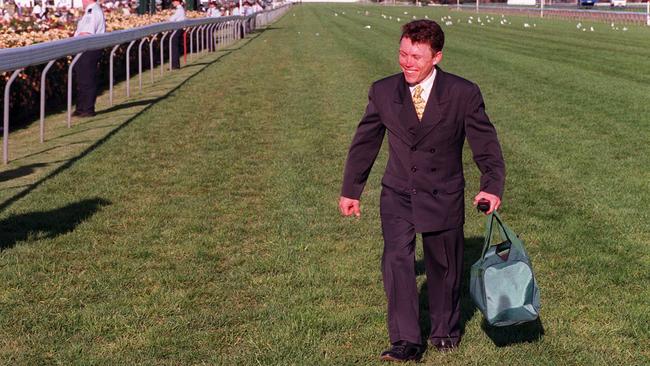 Chris Munce leaves Flemington after the Melbourne Cup meet in 1998.