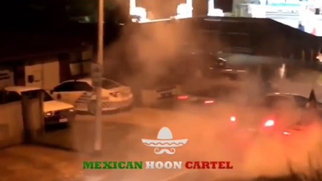 Mexican Hoon Cartel do burnouts in front of Elanora Neighbourhood Police Beat