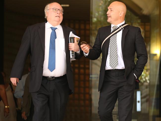 Defence lawyers Mark Austin, left, and Simon Joyner leave the Downing Centre. Picture: Sam Ruttyn