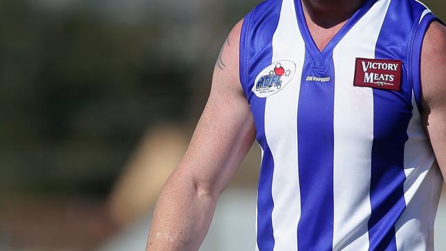 Former AFL player Barry Hall walks to the clubrooms at half time during the match between Broadford and Lancefield at the Harley Hammond Reserve in Broadford on Sunday 7th April, 2013.