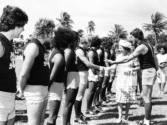 The Queen inspects the St Mary's football team at Gardens Oval. Picture: NT News staff photographer.