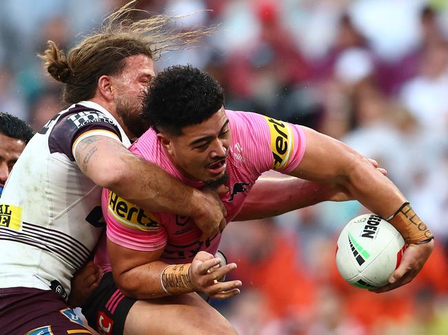 BRISBANE, AUSTRALIA - MAY 04: Luron Patea of the Panthers is tackled during the round nine NRL match between the Penrith Panthers and Brisbane Broncos at Suncorp Stadium on May 04, 2025, in Brisbane, Australia. (Photo by Chris Hyde/Getty Images)