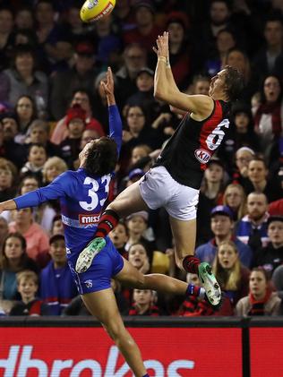 Joe Daniher takes a big mark over Lewis Young. Picture: Michael Klein