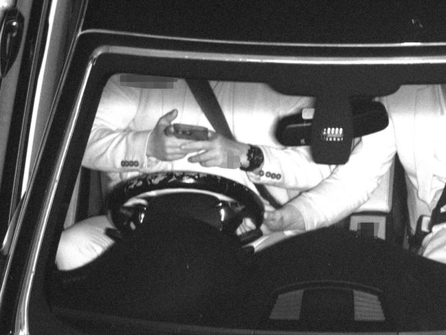 A passenger steers while the driver uses their phone. Picture: Queensland police