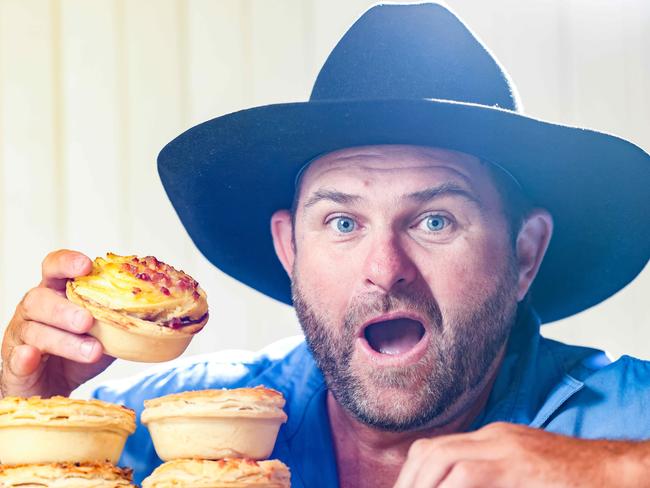 ADV NEWS Shaun Pyne, pie reviewer, eating pies at St Peters Bakehouse & Coffee Shop St PetersImage/Russell Millard Photography