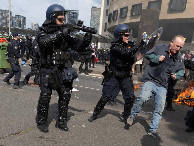 Rubber bullets and rounds of tear gas were fired at anti-war demonstrators. Picture: Jake Nowakowski