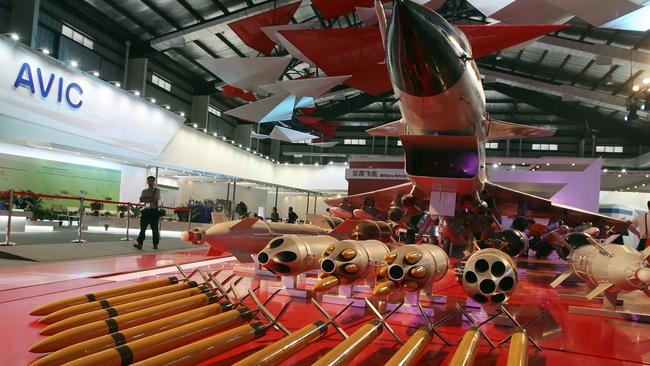 A model of the J-10 Chinese fighter jet with examples of its payload. Picture: AP.