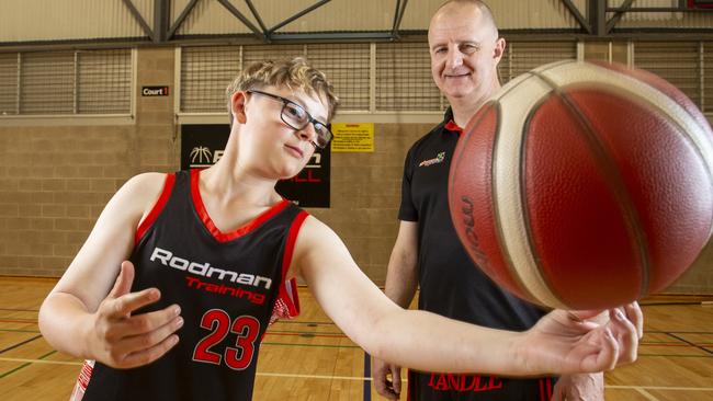 Rodman basketball coach Roddy Dowdell with student, Jackson Penal 12. Rodman Basketball Club has been an integral part of Jackon's improvement as he has lvl 2 autism. Rodman has been nominated as SA's best junior sports coach. 15th November 2024 Picture: Brett Hartwig