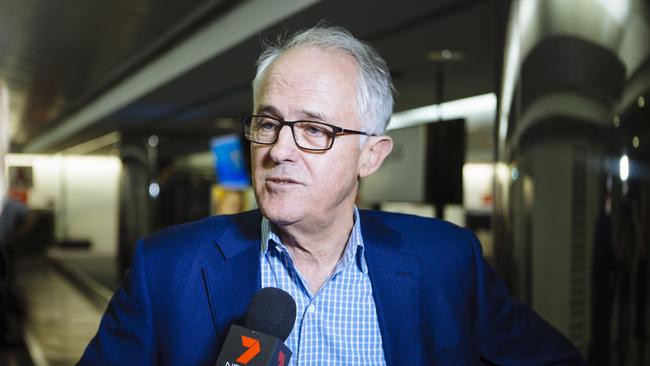 *****EXCLUSIVE PREMIUM LOCKED CONTENT - THE AUSTRALIAN and News.com.au OUT***** Former Australian Prime Minister, Malcolm Turnbull speaks to the media in the baggage claim area at New York's LaGuardia Airport as he arrived for an extended holiday with his wife, Lucy. Queens, New York, USA. Sunday, September 2nd, 2018. (Angus Mordant for NewsCorp Australia)