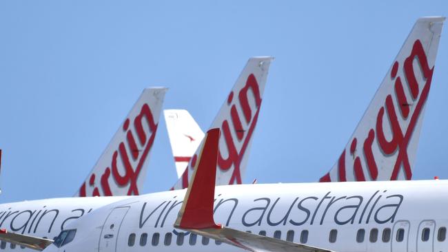 Virgin’s new owner Bain Capital says it will honour credit notes and continue with the Velocity scheme. Photo: AAP Image/David Mariuz