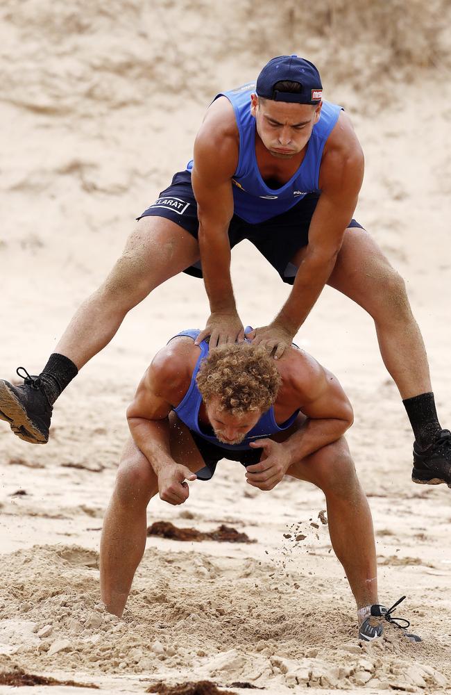 Luke Dahlhaus jumps over Mitch Wallis during a training camp at Torquay. Picture:  Michael Klein