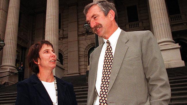 Independent MPs Susan Davies and Russell Savage on the steps of state parliament.