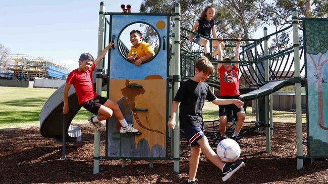 Samuel Saleh, 11, Jakob Saleh, 8, Roman Leaupepe, 6, and Isaac Facey, 10, and Mila Facey, 8, playing and being active at the Gregory St Reserve in Greystanes. Picture: Jonathan Ng