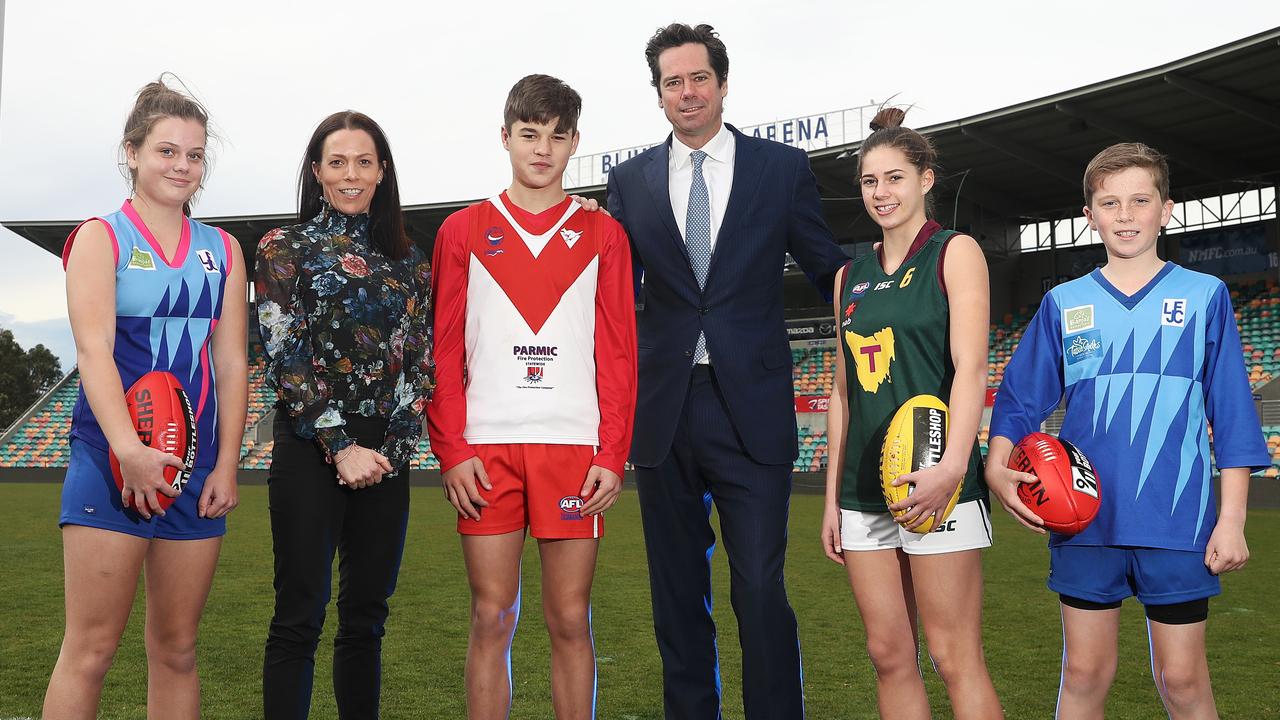 (L-R) Lindisfarne junior footballer Ainsley Spong, AFL Tasmania CEO Trisha Squires, Clarence's Liam Howard, AFL CEO Gillon McLachlan, Clarence and Tasmania State Academy player Tahlia Bortignon and Fletcher Horne from Lindisfarne. Picture: LUKE BOWDEN