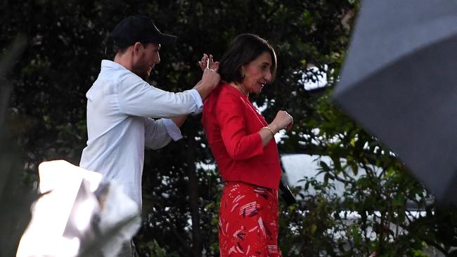 Tireless campaigner... NSW Premier Gladys Berejiklian finishes up a TV interview this morning. Picture: Tracey Nearmy