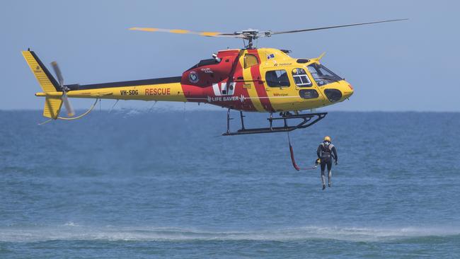 21/10/18 - Surf Life Saving - The WESTPAC Rescue Helicopter and South Australian Surf Rescue Crew practice their deep water rescues at Aldinga Beach. Picture SIMON CROSS