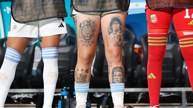 Yamila Rodriguez’s divisie Cristiano Ronaldo tattoo (bottom right) sits alongside one of Diego Maradona. Picture: Getty