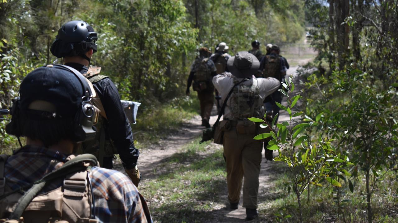 OPERATION TEMPEST: SID players move out on patrol during Operation Tempest. Photo: Stuart Fast