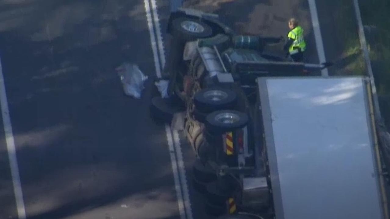 Drone footage shows the scene of a double fatal truck rollover on the Cunningham Highway at Tregony. Images: ABC News