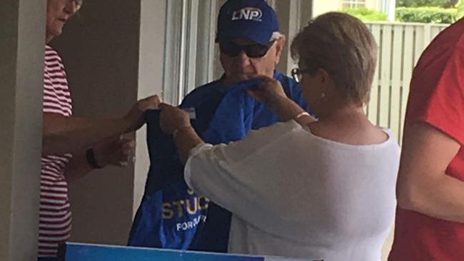 Photos have emerged of an LNP volunteer appearing to hand out how to vote cards for both Currumbin MP Jann Stuckey and independent candidate Andy Semple. Picture: Supplied