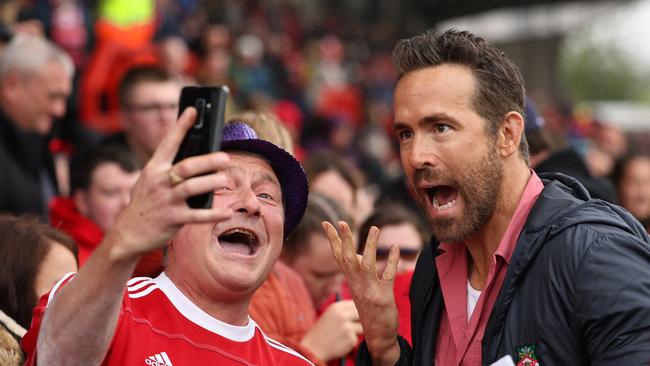 Reynolds with a fan. Photo by Matthew Ashton – AMA/Getty Images