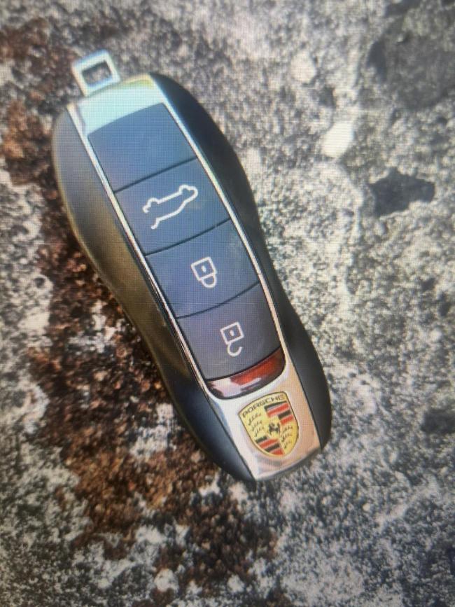 The vehicle key to the stolen Porsche was found on a back tyre, indicating to police it was planted there as a getaway vehicle after a serious organised crime. Supplied.