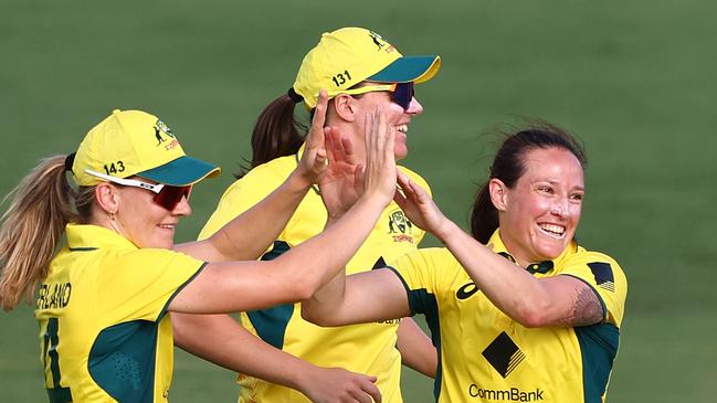 BRISBANE, AUSTRALIA - DECEMBER 05: Megan Schutt of Australia celebrates a wicket during game one of the Women's One Day International Series between Australia and India at Allan Border Field on December 05, 2024 in Brisbane, Australia. (Photo by Chris Hyde/Getty Images)