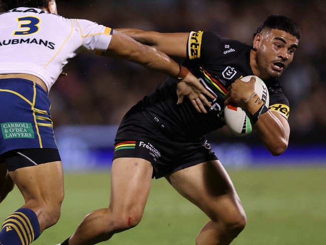 PENRITH, AUSTRALIA - MARCH 15: Taylan May of the Panthers is tackled during the round two NRL match between Penrith Panthers and Parramatta Eels at BlueBet Stadium, on March 15, 2024, in Penrith, Australia. (Photo by Jason McCawley/Getty Images)