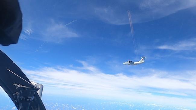 A Malaysian fighter shadows a Chinese People's Liberation Army Air Force Ilyushin Il-76 on Monday. Picture: AFP