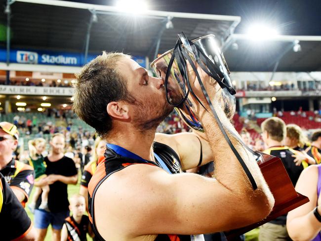 NT Thunder legend Darren Ewing celebrates his team’s win over Aspley after a thrilling 2015 NEAFL Grand Final at TIO Stadium. Picture: Elise Derwin