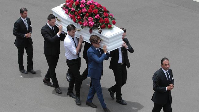 Mourners carry the coffin. Picture: AAP