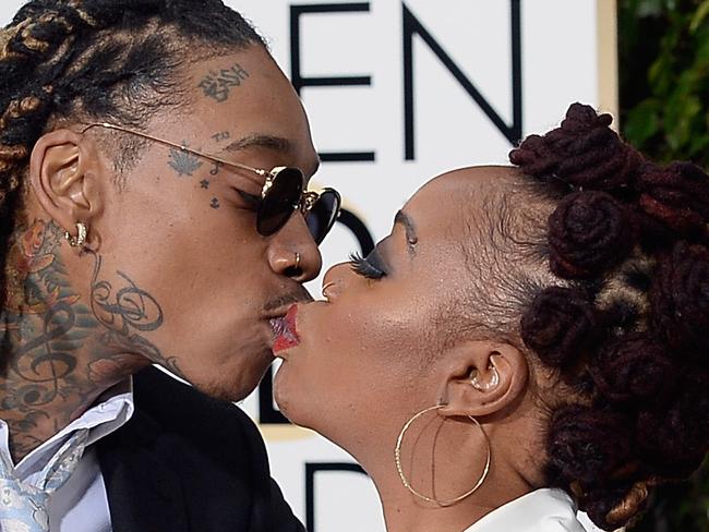 BEVERLY HILLS, CA - JANUARY 10: 73rd ANNUAL GOLDEN GLOBE AWARDS -- Pictured: Recording artist Wiz Khalifa (L) and Peachie Wimbush arrive to the 73rd Annual Golden Globe Awards held at the Beverly Hilton Hotel on January 10, 2016. (Photo by Kevork Djansezian/NBC/NBCU Photo Bank via Getty Images)