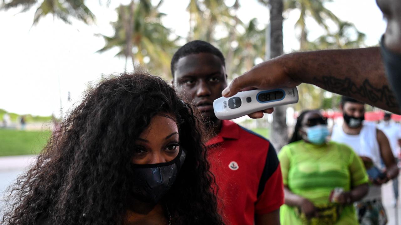 People get their temperature checked at Miami Beach, Florida. Picture: Chandan Khanna / AFP