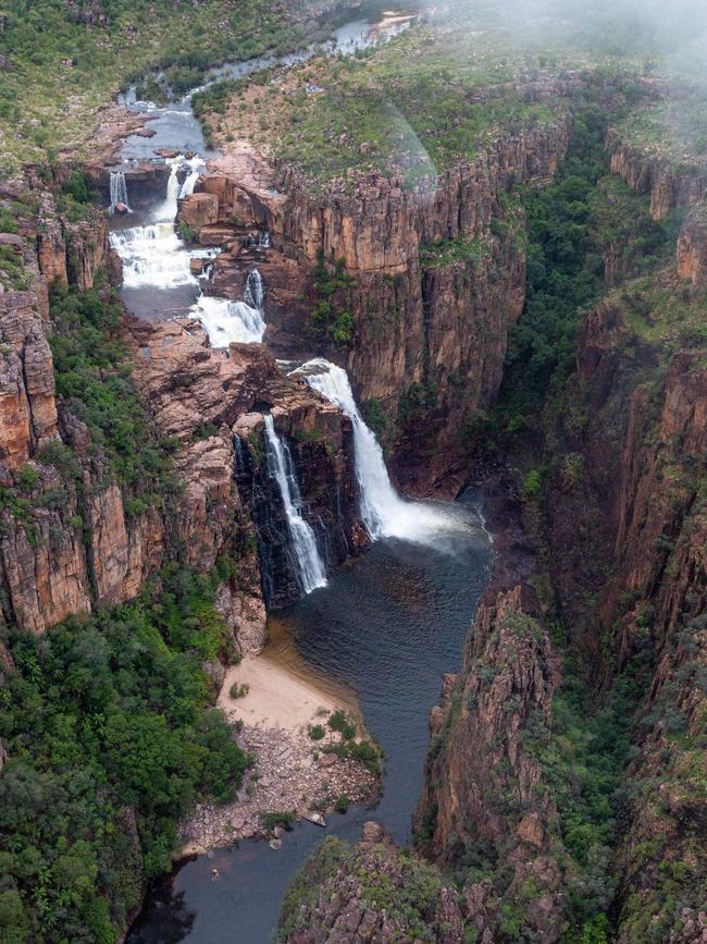 A view of the Twin Falls from aboard a scenic flight with Kakadu Air. Picture: Che Chorley