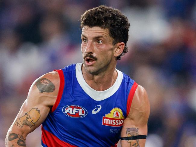 MELBOURNE, AUSTRALIA - MARCH 31: Tom Liberatore of the Bulldogs in action during the 2024 AFL Round 03 match between the Western Bulldogs and the West Coast Eagles at Marvel Stadium on March 31, 2024 in Melbourne, Australia. (Photo by Dylan Burns/AFL Photos via Getty Images)