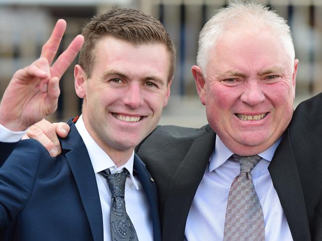 MELBOURNE, AUSTRALIA - AUGUST 13: Trainer Clayton Douglas and Rod Douglas, racing manager representing owner  are seen after Giga Kick won Race 5, the Stow Storage Solutions Vain Stakes, during Melbourne Racing at Caulfield Racecourse on August 13, 2022 in Melbourne, Australia. (Photo by Vince Caligiuri/Getty Images)