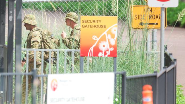 ADF members at the security gatehouse at the entrance to the former Inpex workers’ village at Howard Springs which is being used to house Australian evacuees from Wuhan. Picture: Glenn Campbell