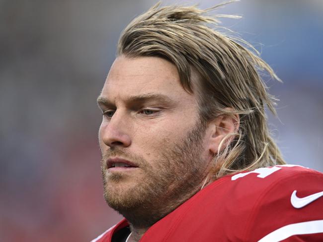 CHARLOTTE, NORTH CAROLINA - OCTOBER 09: Mitch Wishnowsky #18 of the San Francisco 49ers runs off the field at halftime against the Carolina Panthers Bank of America Stadium on October 09, 2022 in Charlotte, North Carolina. (Photo by Eakin Howard/Getty Images)